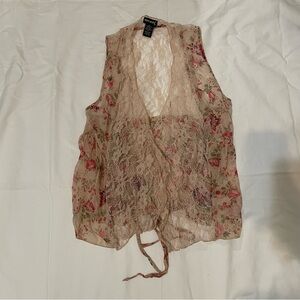 Sheer cream and pink lace vest with floral details and adjustable tie